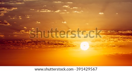 Panorama of Beautiful Sunset Sunrise. Panoramic Background. Yellow and orange warm colors of natural sunrise. Sunshine dramatic sky