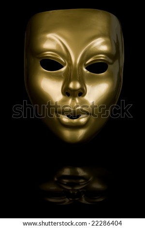 Gold mask isolated on black background