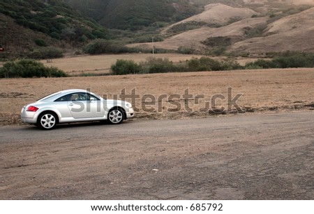 Sports Car on Dirt Road