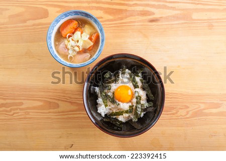 Japanese style pork stewed with rice and preserved egg yolk