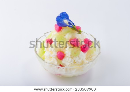 Coconut milk flavoured shave ice with sweet rice noodle and Stuffed Water Chestnuts.