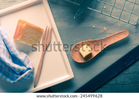 Fresh butter cake on table in kitchen with vintage color tone