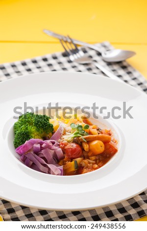 Pasta with red sauce, pasta made from sweet potato, clean food.