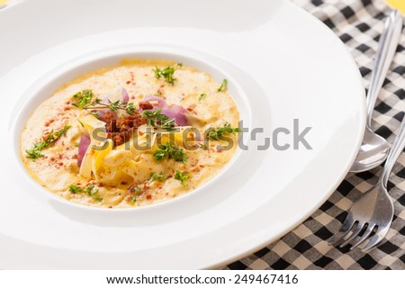 Pasta carbonara in white dish, pasta made from sweet potato, vegetarian food