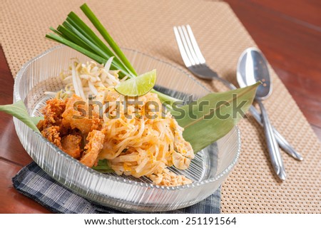 Thai stir-fried noodle (Pad Thai) with fried chicken, Thai fusion food