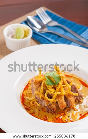 Yellow noodles (Khao Soi) with fried pork, Fusion food