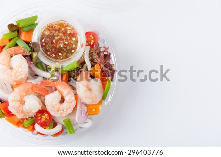 Thai spicy salad with shrimps cooked by clean food concept in lunch box