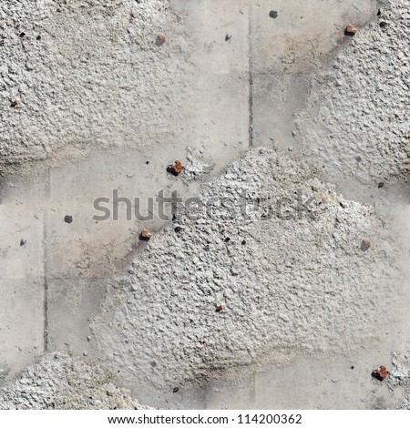 seamless wallpaper texture square of old stone wall with a crack background