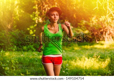 sunlight beautiful healthy runs young brunette woman athlete a running outdoors, fitness and healthy lifestyle, running in forest