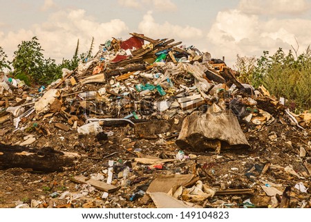 large pile of debris, city dump pollution
