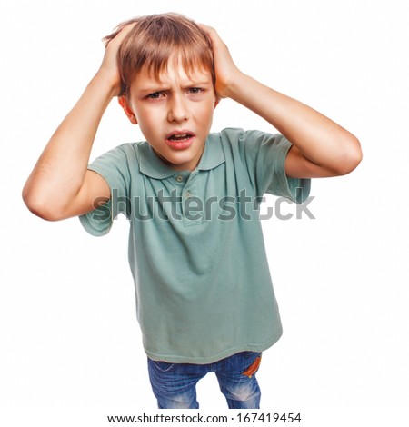 Boy child man upset angry shout produces evil face portrait isolated emotion