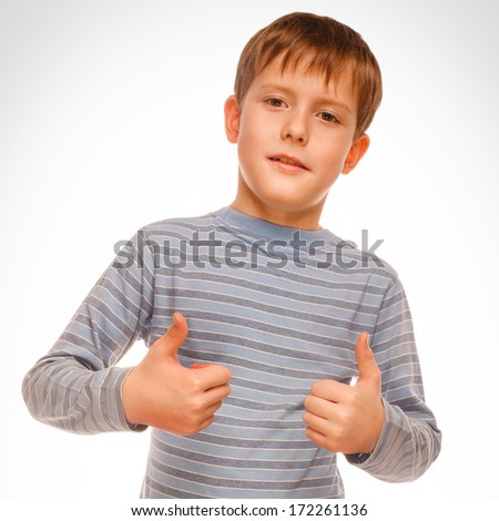 boy kid blonde in striped jacket holding thumbs up, showing sign yes studio isolated on white large