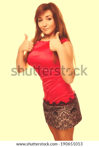 girl yes brunette woman shows positive sign thumbs isolated emotion in red dress cross processing retro