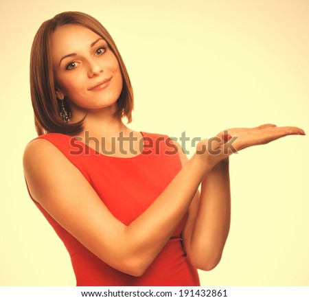 happy young girl showing portrait naked woman holding her hand in orange dress emotion isolated gray large cross processing retro