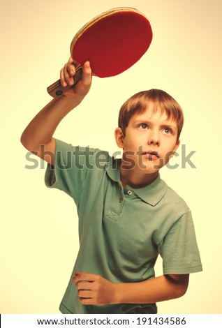 blond man boy playing table tennis forehand takes topspin isolated emotion gray large cross processing retro