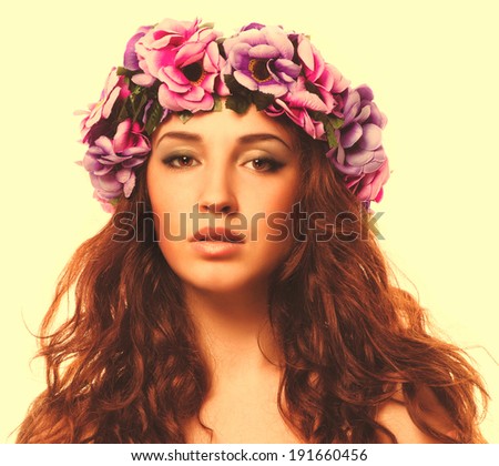 model beautiful woman face close-up of head beauty, wreath flowers her head isolated on white background large cross processing retro