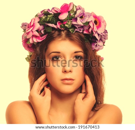beautiful model woman face beauty close-up head, wreath flowers head her isolated on white background large cross processing retro