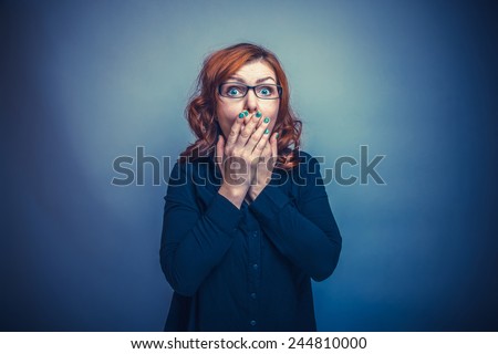 European - looking  woman 30 years  his hands over his mouth cross process