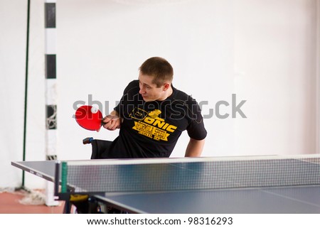 URYUPINSK- RUSSIA - MARCH 17: athlete sport young table tennis, ping-pong,  disabled athlete, Alexander Gorsky, 14 Open Championship of memory Uryupinsk NS Demidenko, Uryupinsk-Russia, March 17 2012.