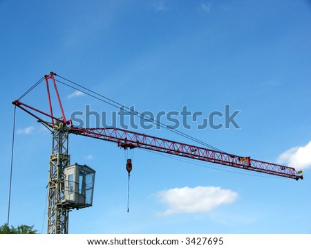 portrait of old mobile crane at construction site