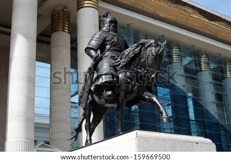 A statue of Ghengis Kahn adorns the front stoop of the parliament building in Ulaanbaatar, the capital of Mongolia.