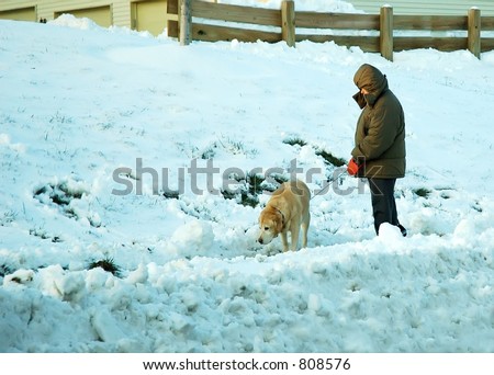 Walking the dog in the snow can be a challenge.