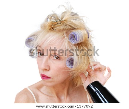 curlers in her hair,