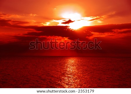 Sunset, Gulf of Mexico - A brilliant sunset over the water of the Gulf of Mexico at Ft Meyers Beach in December.