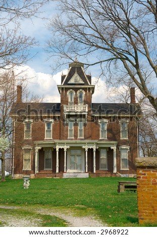 Historic Brick Home Circa 1800s - A typical two story brick home in the country that was built in the 1800s.