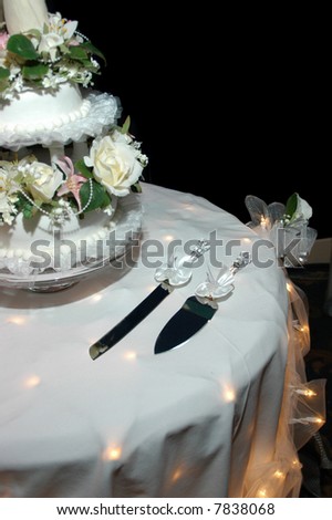 stock photo Wedding Cake Table with cake knife and spatula waiting for the 