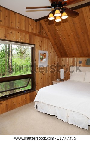 Cedar Bedroom - A cedar walled bedroom in a cedar chalet home.