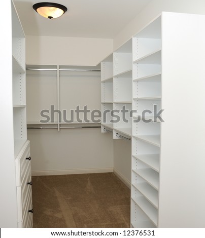 Empty Built-In Clothes Closet in a luxury home.