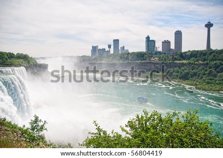 Niagara Falls, Ontario, Canada is seen across the Niagara river where the tour boats begin the ride to the base of the Horseshoe falls.