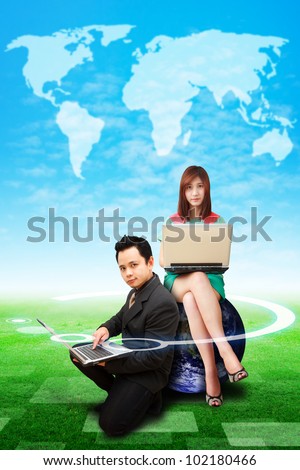 Digital man and lady on globe watching the world map on the sky : Elements of this image furnished by NASA