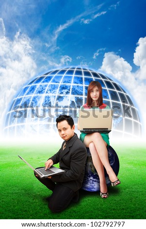 Business man and lady on globe on the grass field : Elements of this image furnished by NASA