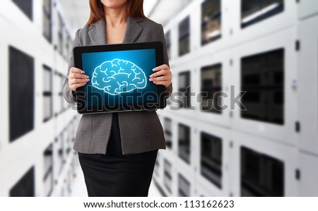 Lady and brain icon on tablet in data center room
