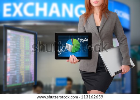 Business woman with graph report for exchange rate