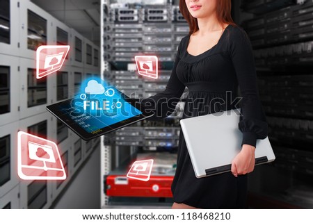 Programmer in data center room with file system