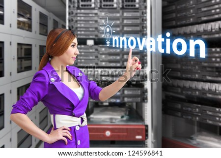 Programmer and innovation word in data center room