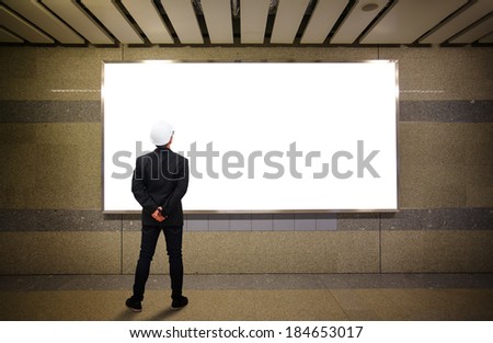 Businessman look at the board