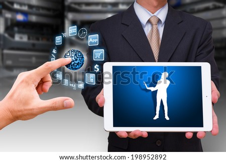 Business man and icon control in data center room