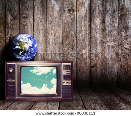 Old vintage TV in the Vintage wooden room  : Earth view image from http://visibleearth.nasa.gov/