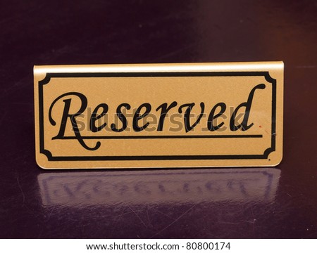 Reserved sign on the table
