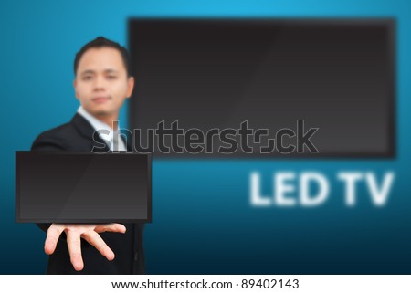 Business man show LED TV