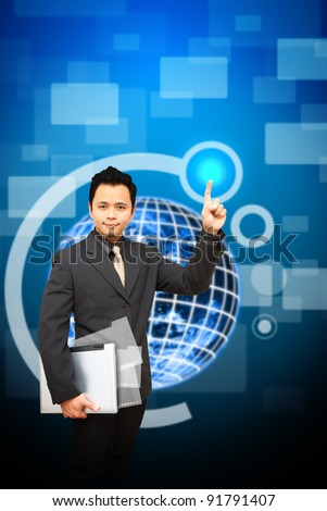 Business man hold notebook computer with digital earth background