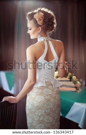elegant slender bride with a good figure in an elegant dress