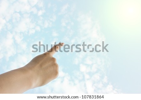 Pointing hand  to sky