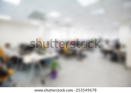 modern office interior with table and desk blurred for logo input