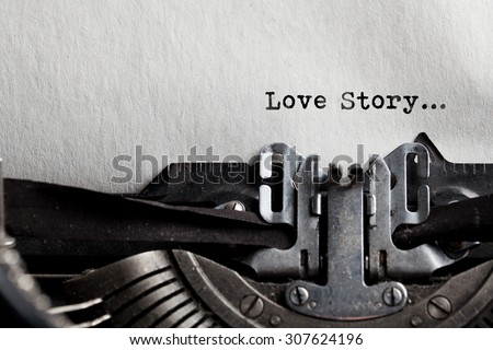 typewriter with white paper. love story sign
