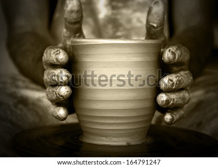 Close-Up Of Potter'S Hands With The Product On A Potter'S Wheel